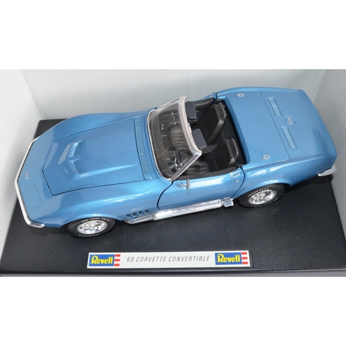 1150 - 2 1/18 scale Revell diecast model cars:
1956 Ford Thunderbird (cat no 8804)
1969 Corvette Convertibl... 