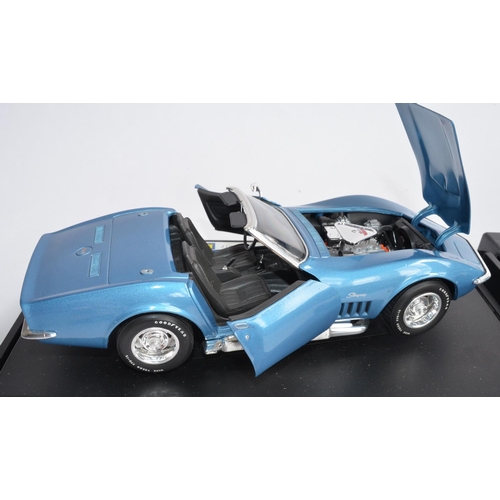 1150 - 2 1/18 scale Revell diecast model cars:
1956 Ford Thunderbird (cat no 8804)
1969 Corvette Convertibl... 