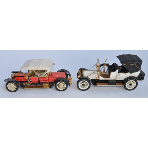 1154 - 2 1/24 scale Franklin Mint die-cast model cars:
1910 Rolls Royce Ghost, model only, no box, COA etc ... 