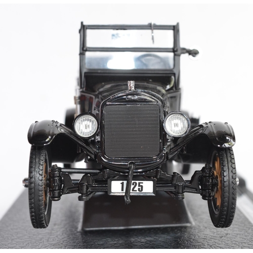 1155 - A 1/24 Sun Star 1925 Ford Model T, item no 1904. Attached to base.