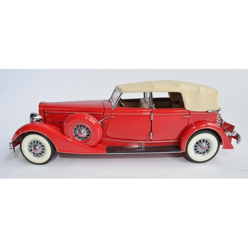 1157 - A boxed Franklin Mint 1934 Packard Convertible sedan, no paperwork.