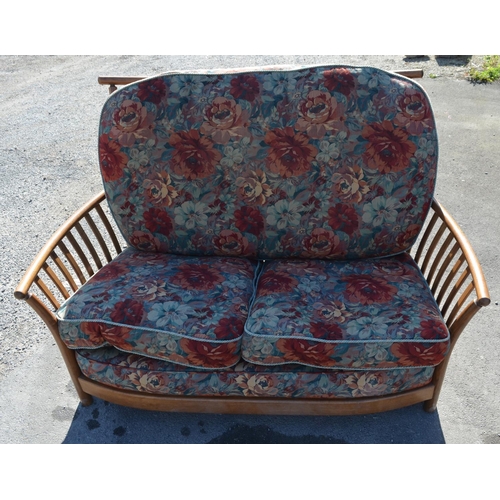 1202 - Ercol Renaissance three piece suite and stool, with floral loose back and seat and arm cushions, W12... 