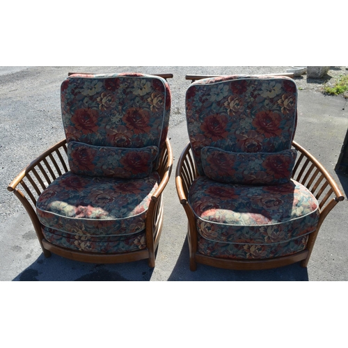 1202 - Ercol Renaissance three piece suite and stool, with floral loose back and seat and arm cushions, W12... 