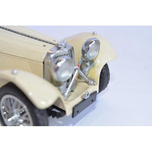 1166 - 2 Franklin Mint 1/24 die-cast 1938 Jaguar SS100 models, one boxed (box fair with photo of model atta... 