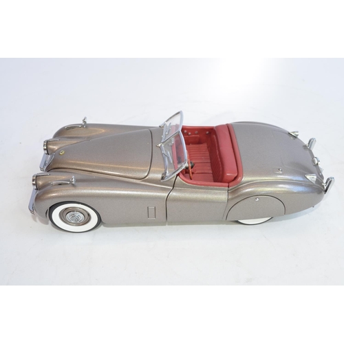 1171 - 3 1/24 Franklin Mint die-cast model cars, no boxes/paperwork:
A 1948  MGTC Roadster in near mint con... 