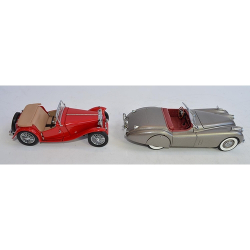 1171 - 3 1/24 Franklin Mint die-cast model cars, no boxes/paperwork:
A 1948  MGTC Roadster in near mint con... 