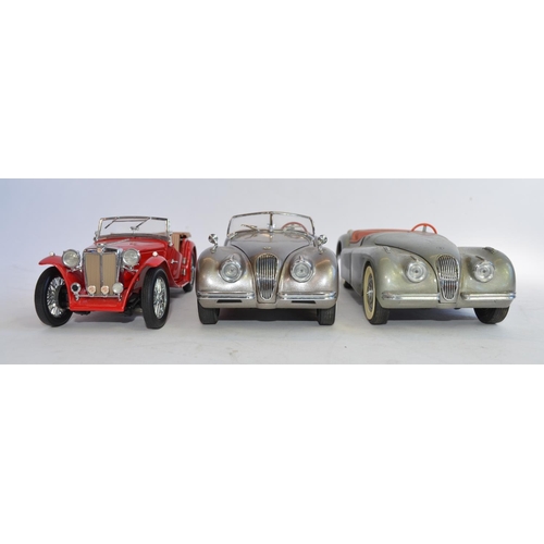 1171 - 3 1/24 Franklin Mint die-cast model cars, no boxes/paperwork:
A 1948  MGTC Roadster in near mint con... 