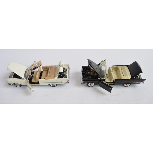 1177 - 2 boxed 1/24 diecast 1957 Crysler 300C convertible model cars:
1 Danbury Mint white version in very ... 