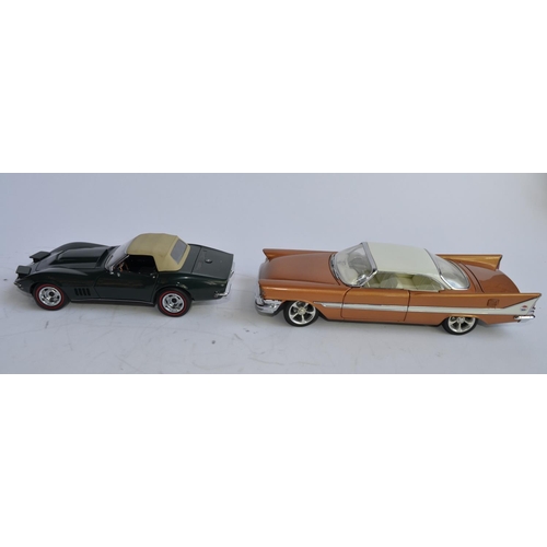 Two 1/24 Danbury Mint diecast car models: boxed 1957 Chrysler 300C 