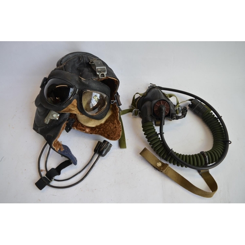 1196 - A Cold War Russian fur lined flying helmet and mask. No sizes, makers marks etc.