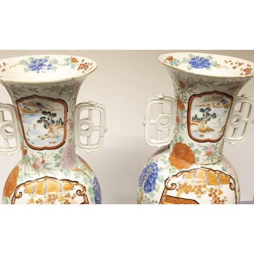 2028 - The Grange Goathland - Pair of late C19th Japanese Kutani porcelain two handled vases, painted with ... 