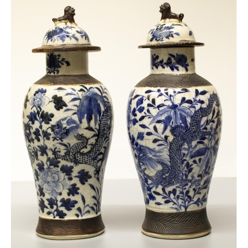 2029 - The Grange Goathland - Pair of C19th Chinese crackle glaze baluster vases and covers, with blue and ... 