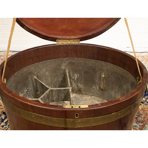 1395 - Geo. III brass banded coopered mahogany oval wine cooler, with hinged top and two brass carry handle... 