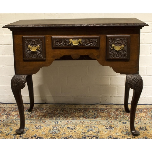 2200 - The Grange Goathland - Geo.111 oak lowboy, moulded top and three frieze drawers with brass handles, ... 