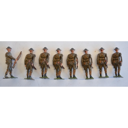 2113 - The Grange Goathland - Two vintage W.Britain's hollow lead cast British Army soldier sets, both righ... 