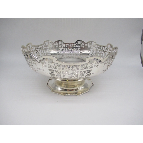 1032 - ER.11 hallmarked silver circular pedestal bowl, pierced in Victorian style with trellis and leafage,... 