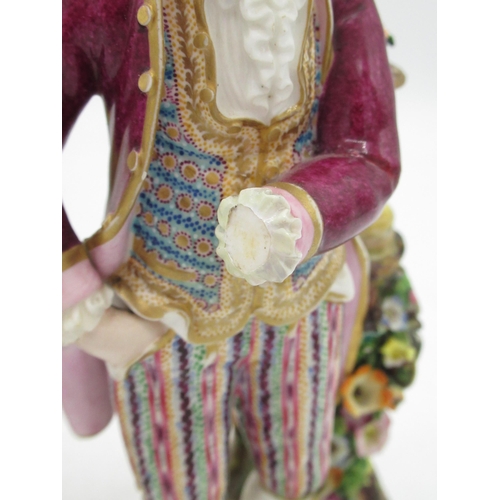 1185 - Pair of C19th Continental porcelain models of lady and gentleman gardeners, both in C18th dress with... 