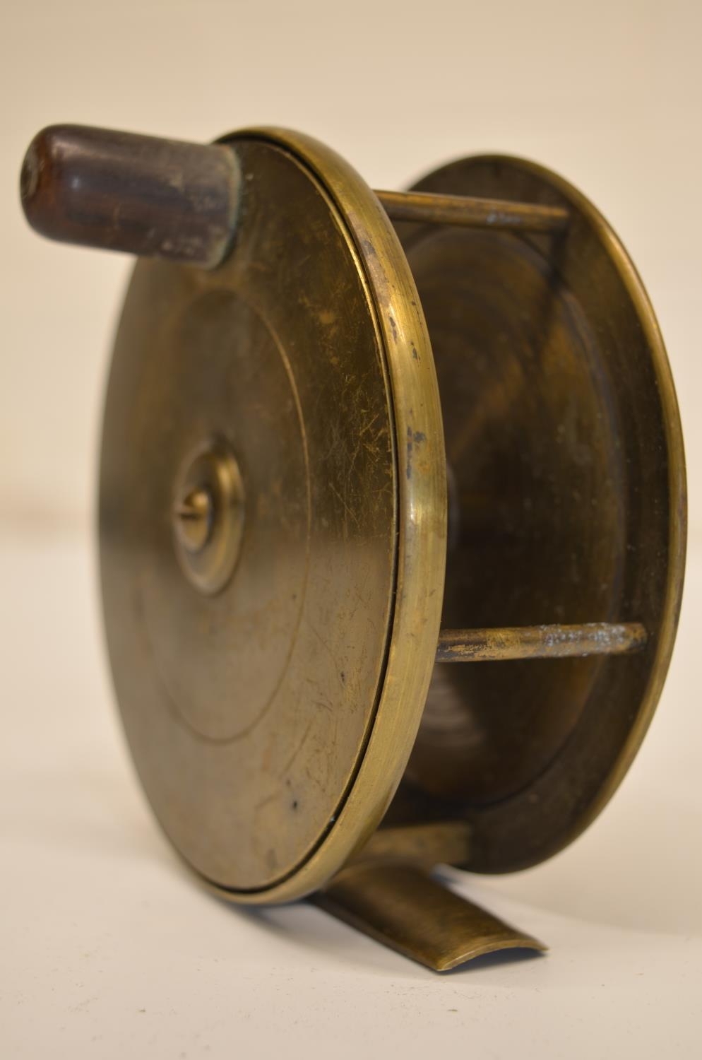 The Grange Goathland - Brass centrepin vintage salmon reel, horn handle,  D11cm, W3.4cm across pillar