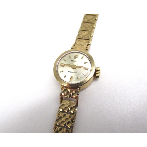 1076 - Ladies Rolex precision 9ct gold handwound wristwatch, signed silvered dial with applied baton hour m... 