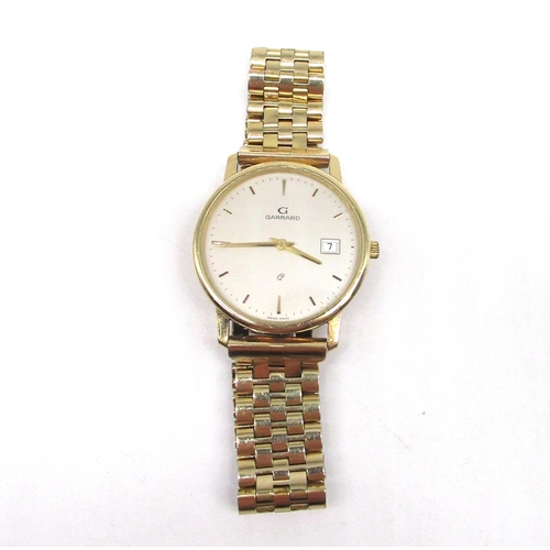 1078 - 1990's Garrard 9ct gold quartz wristwatch with date, signed cream dial with applied baton hours and ... 