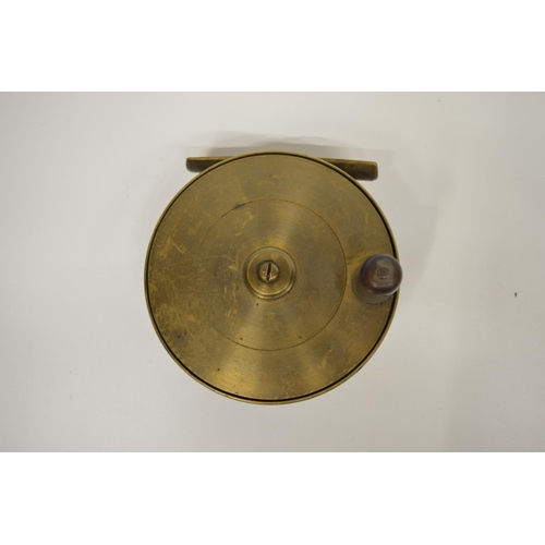 2088 - The Grange Goathland - Brass centrepin vintage salmon reel, horn handle, D11cm, W3.4cm across pillar... 