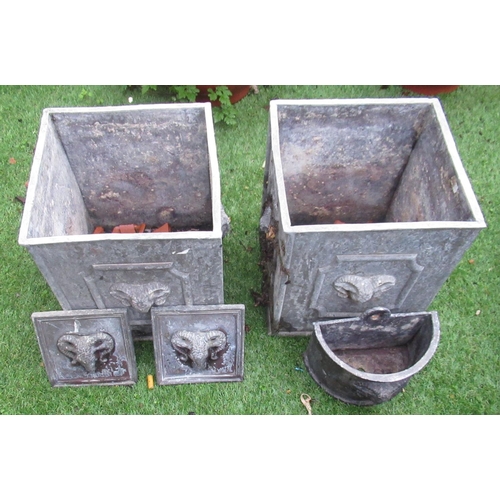 2317 - Pair of lead planters with ram's head relief design, H30cm W26cm, a pair of wall plaques with ram's ... 