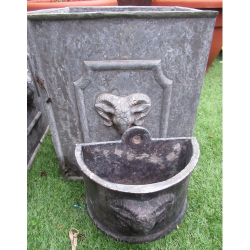 2317 - Pair of lead planters with ram's head relief design, H30cm W26cm, a pair of wall plaques with ram's ... 