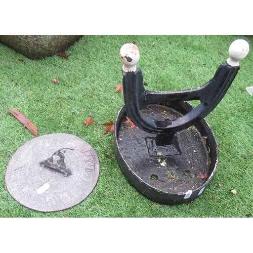 2327 - Cast metal boot scraper and lead sundial with Roman numerals to edge