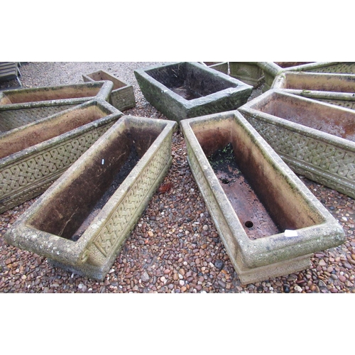 2284 - Pair of reconstituted stone planters, with scroll ends and fleur de lis decoration, 92cm x 33cm, app... 