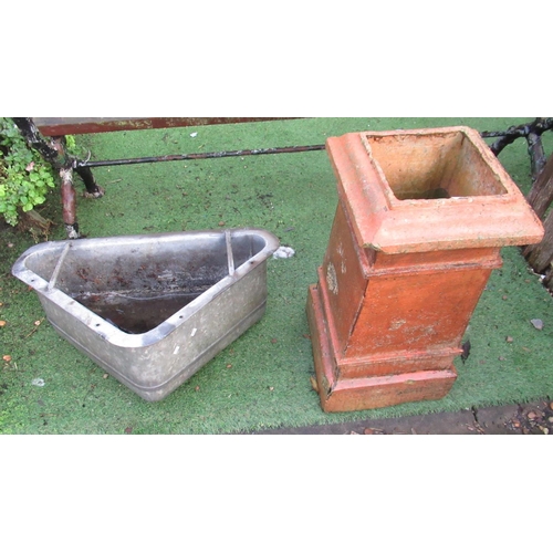 2301 - Terracotta chimney pot approx 71cm x 35cm, galvanised cow feeder/trough 73cm x 45cm (2)