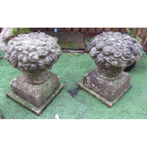 2232 - The Grange Goathland - Pair of stone garden ornaments, in shape of vase of flowers, on plinths - 41c... 