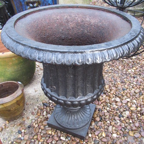 2292 - Pair of cast garden urns (one A/F) 50cm x 44cm, single cast garden urn 50cm x 29cm (3)