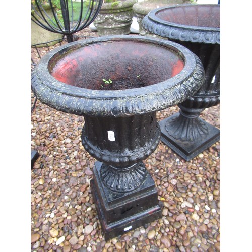 2292 - Pair of cast garden urns (one A/F) 50cm x 44cm, single cast garden urn 50cm x 29cm (3)