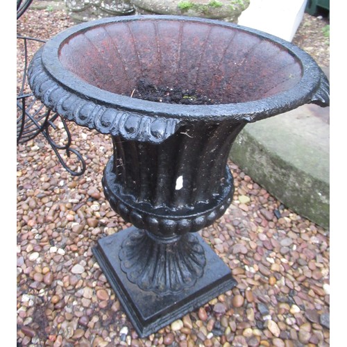 2292 - Pair of cast garden urns (one A/F) 50cm x 44cm, single cast garden urn 50cm x 29cm (3)