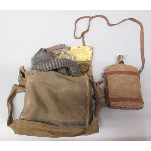 2265 - The Grange Goathland - WWII 1943 gas mask complete with anti-flash ointment, anti-dimming Mark II fi... 