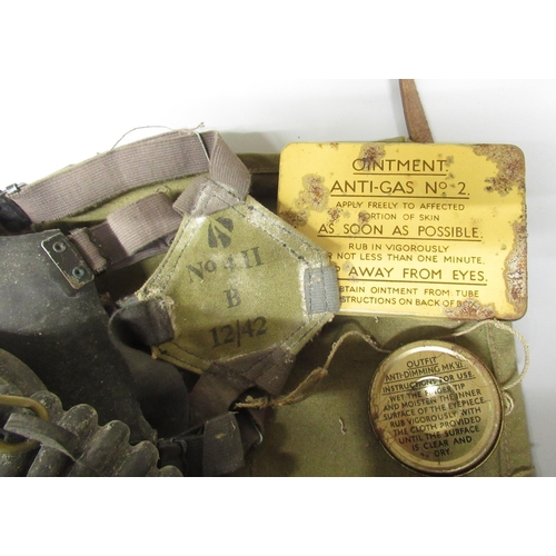 2265 - The Grange Goathland - WWII 1943 gas mask complete with anti-flash ointment, anti-dimming Mark II fi... 