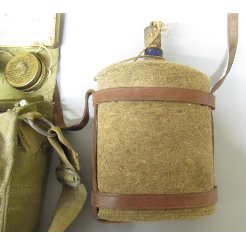 2265 - The Grange Goathland - WWII 1943 gas mask complete with anti-flash ointment, anti-dimming Mark II fi... 