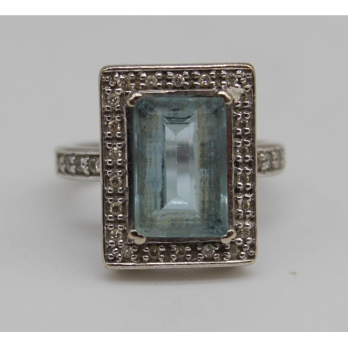 1 - 9ct white gold ring set with emerald cut aquamarine, surrounded by diamonds in millegrain setting, s... 
