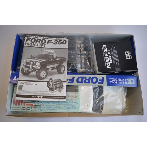 301 - Unbuilt boxed Tamiya 1/10th scale Ford F-350 High Lift radio control 4x4 Pick-up truck, item no 5837... 