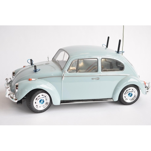 304 - Competently built up Tamiya 1/10th scale radio control Volkswagen Beetle model. Has a TX26.995MHz re... 