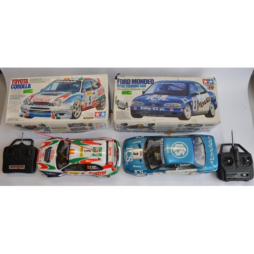 305 - 2 Tamiya 1/10 radio control cars with transmitters, both A/F: Ford Mondeo BTCC Touring car. Front ri... 