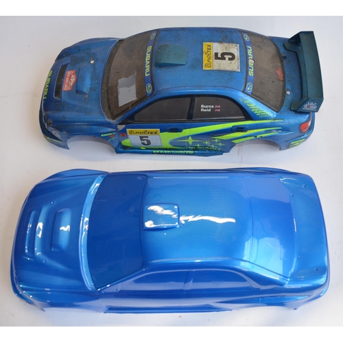 309 - 2 Tamiya 1/10 glow engine powered remote control cars, both A/F. Item No 44034-27800 Subaru Impreza ... 