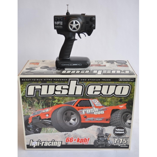 311 - Boxed HPI Rush Evo 2WD 1/10 scale ready to run nitro powered radio control car with radio gear, inst... 