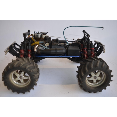 313 - Large Traxxus pre-built ready to run radio control off-road nitro car with transmitter, instructions... 