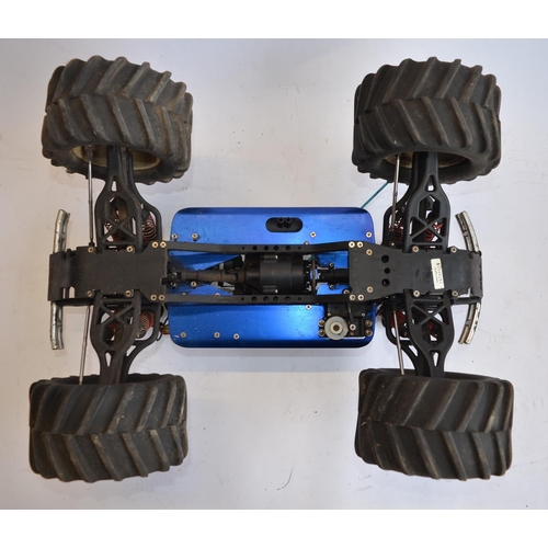 313 - Large Traxxus pre-built ready to run radio control off-road nitro car with transmitter, instructions... 