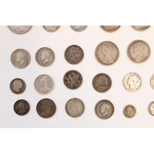 614 - Selection of GB Geo. III to QV silver content coinage, half crown through threepence.  Silver weight... 