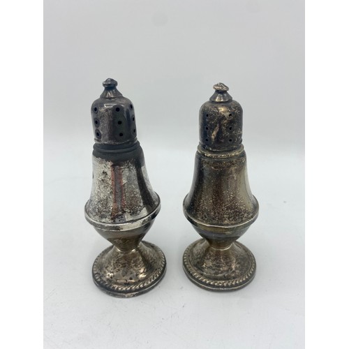 90 - Pair of silver plated salt and pepper mills with weighted bases, stamped Dutch Creation (2)