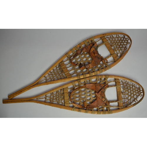 327 - Pair of wooden snow shoes with leather boot strapping. Made by Faber, Loretteville, Quebec, Canada. ... 