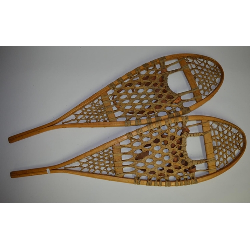 327 - Pair of wooden snow shoes with leather boot strapping. Made by Faber, Loretteville, Quebec, Canada. ... 