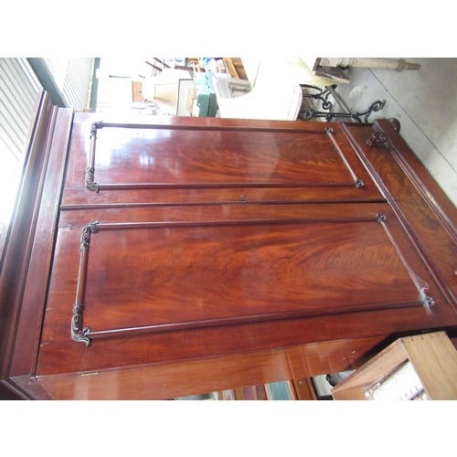 1327 - Victorian mahogany two door wardrobe with moulded cornice above two panelled doors, fitted interior ... 